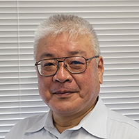 金山　栄一 氏
